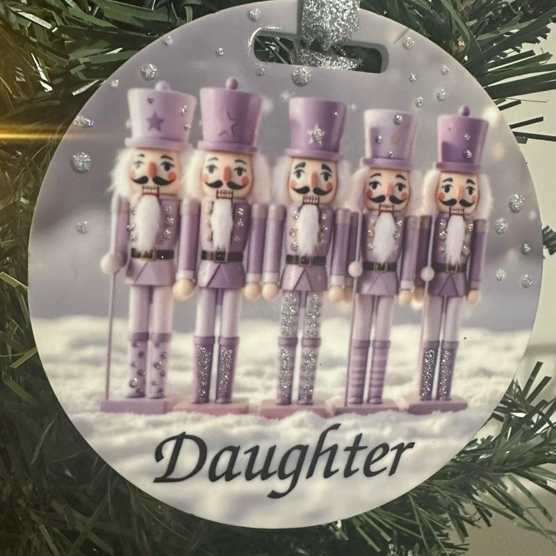 Purple nutcracker Christmas tree bauble acrylic glitter detail