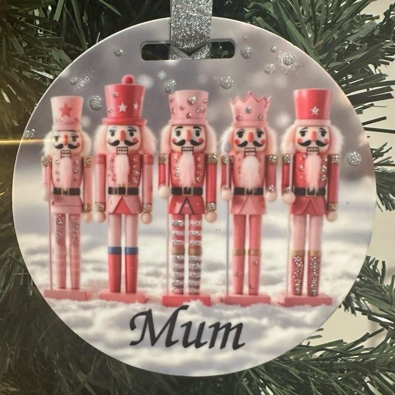 Pink nutcracker Christmas tree bauble acrylic glitter detail