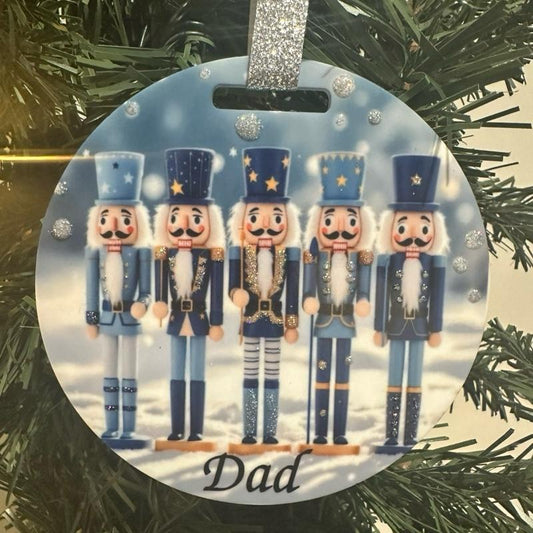 Blue nutcracker Christmas tree bauble acrylic glitter detail